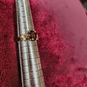 10K Yellow Gold and Garnet Solitaire Ring with Diamond Accents